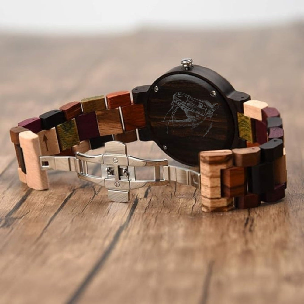 engraved Wooden watch with a multicolored band on a wooden surface