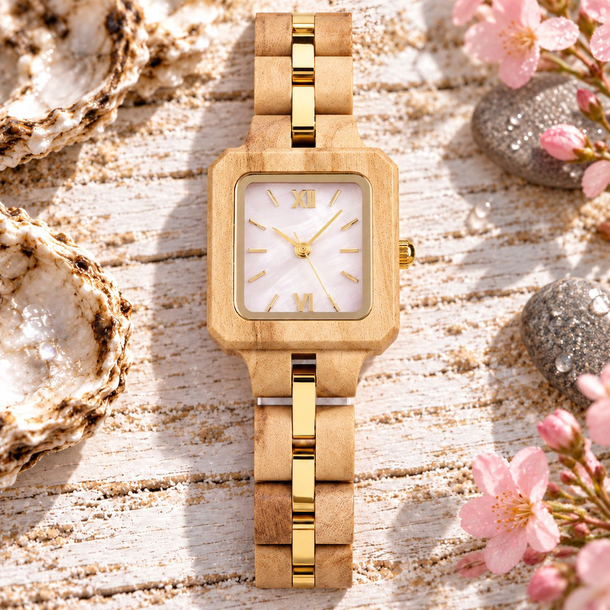 Front view of The Pink Pearl with olive wood and gold-tinted steel links