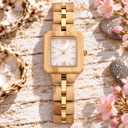 Front view of The Pink Pearl with olive wood and gold-tinted steel links