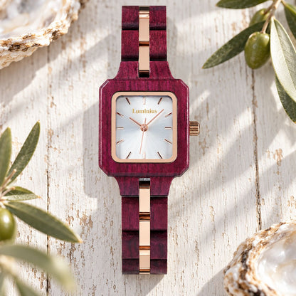 The Rosewood women's dress watch laid flat on whitewashed timber