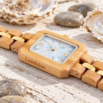 The Blue Pearl laid flat, showing the Luminius name on the olive wood case